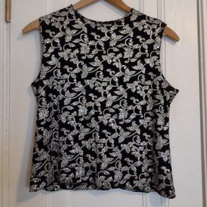 Elegant in Floral-themed Sleeveless Blouse